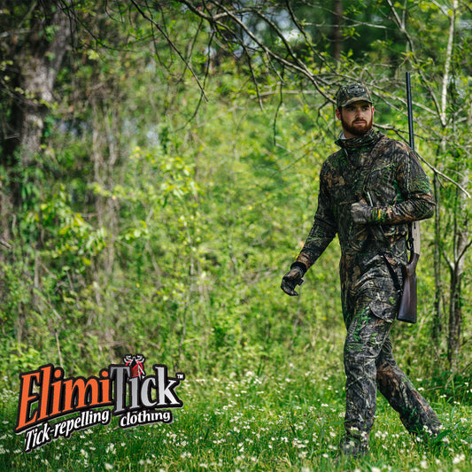 Elimitick hunting clothing in woods walking