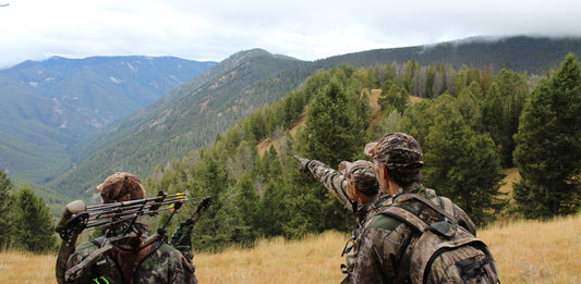 hunters glassing over foggy draw 