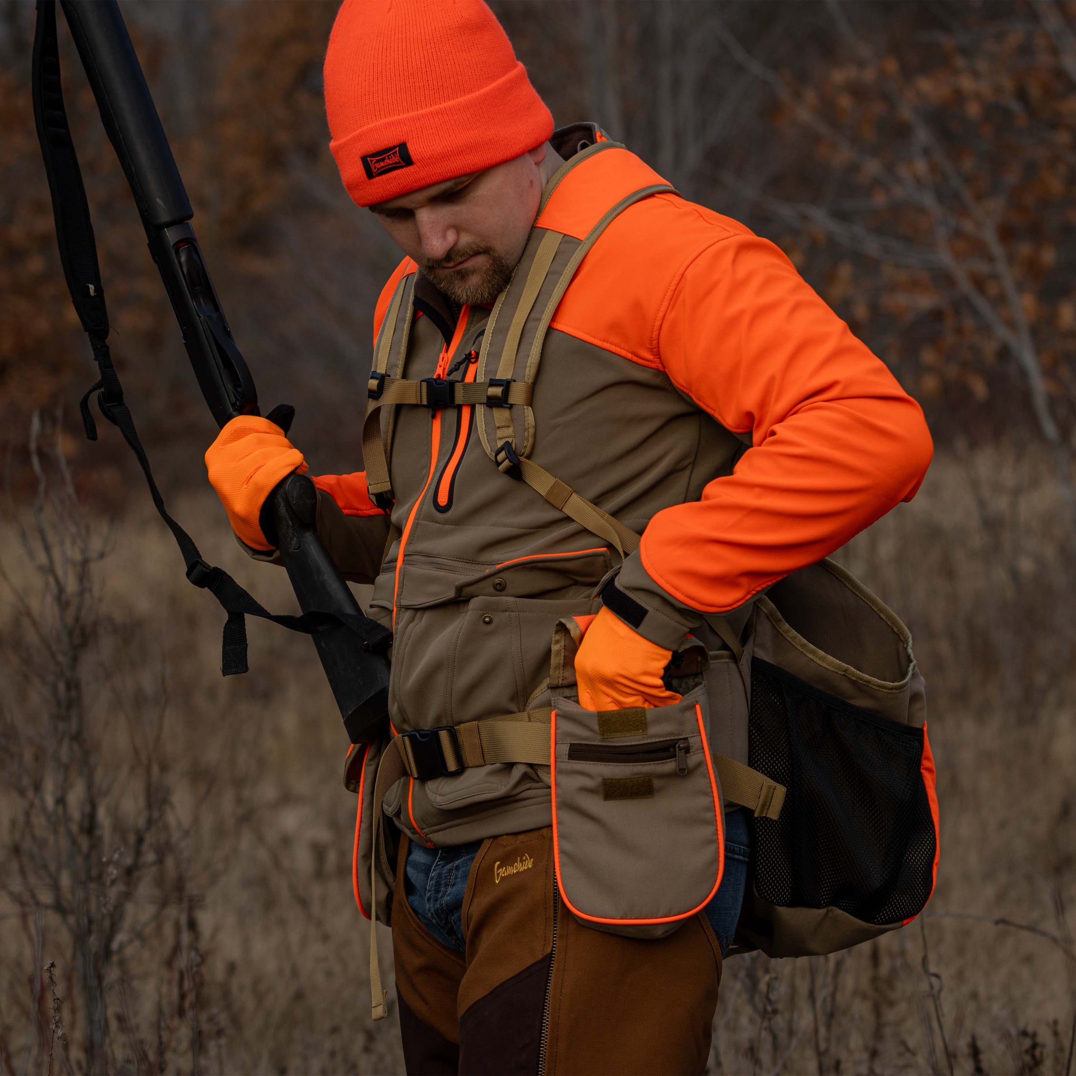 Upland strap vest side view in field