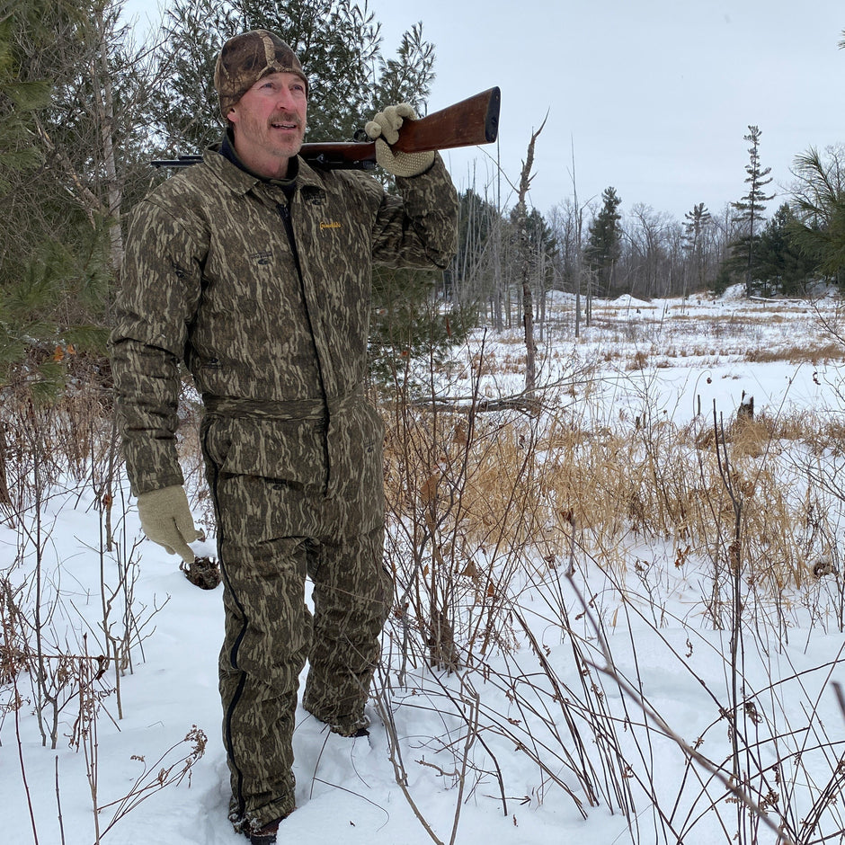 hunter in new bottomland camo coverall